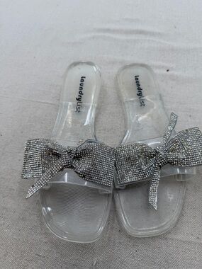 Laundry List Clear Slide Sandals with Silver Bow